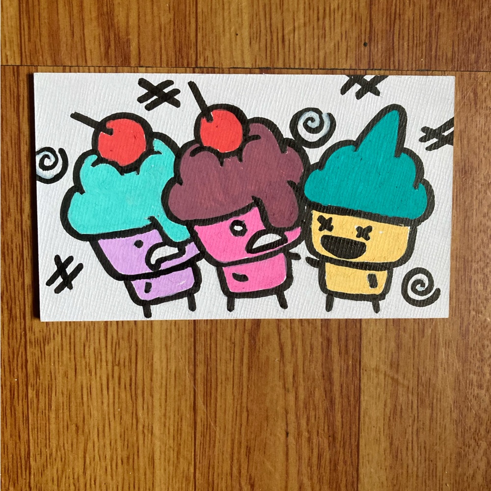 Colorful Cartoon Cupcake Art Print by artist its_mittens